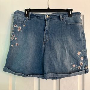 Size 18 medium wash jean shorts with cuffed hem and pink floral embroidery